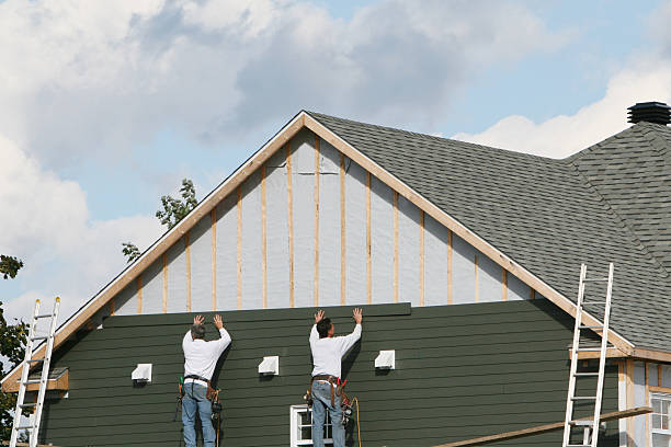 Professional Siding technician working in Urbana, MD